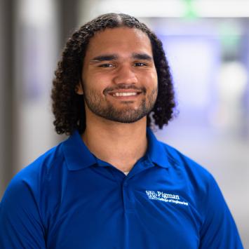 Devin Bester student ambassador headshot in Grehan Building